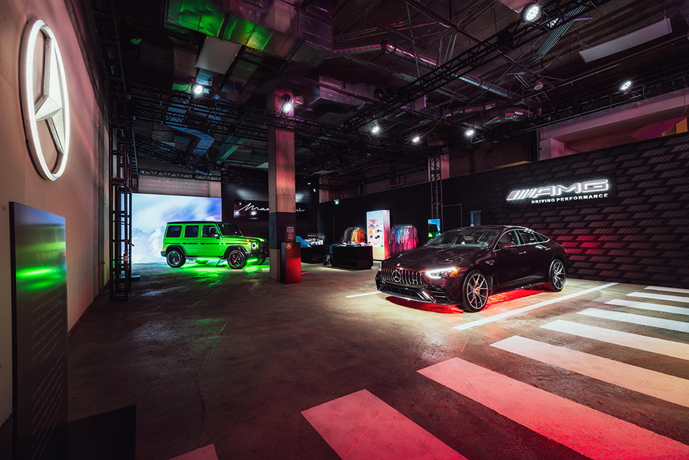 Showcase room with a Mercedes-Benz G63 and E63